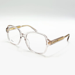 Monture optique Dior transparente avec détails dorés à Bruxelles