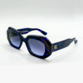 Lunettes de soleil Emmanuelle Khanh bleues et violettes oversize à Bruxelles