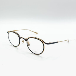 Optique Monture optique Masunaga ronde noire et dorée à Bruxelles