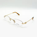 Monture optique Miu Miu sans cerclage avec détails dorés à Bruxelles