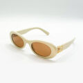 Lunettes de soleil Miu Miu ivoire à verres bruns à Bruxelles